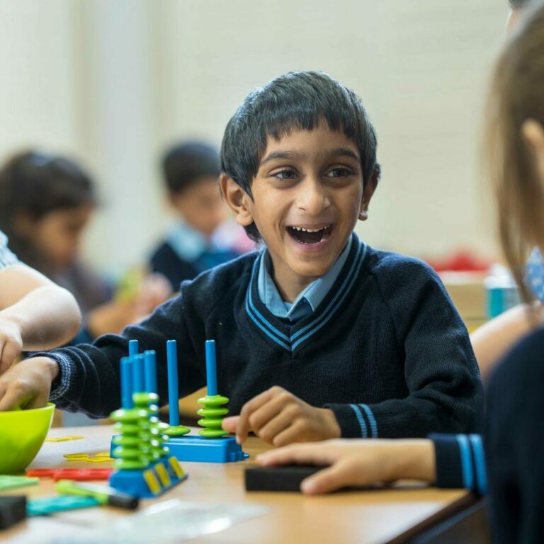 Students playing with toys in the classroom